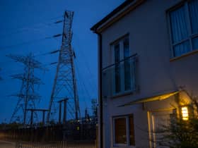 Insulators on an electricity sub station are seen near homes in Manchester.