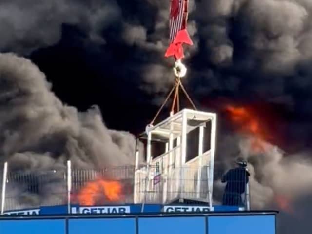 A workman was lifted to safety after a huge fire at a high-rise building in Reading. (Credit: Chris Lauder/X/PA Wire