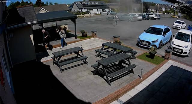 Man runs across pub car park to save pint from ‘mini-tornado’.