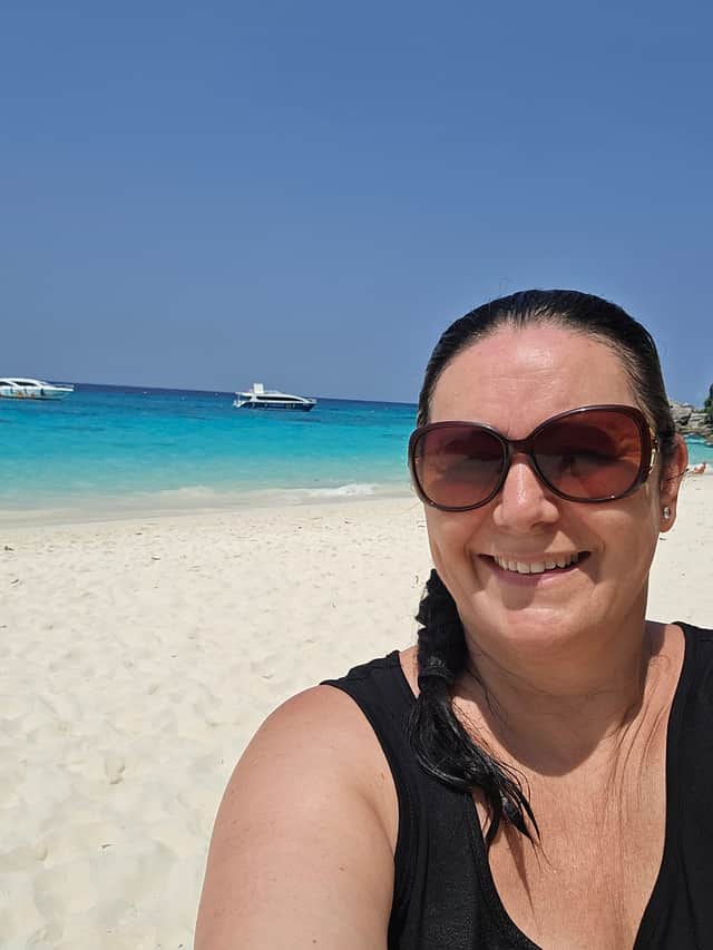 The white sand and turquoise sea is picture postcard beautiful