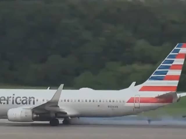 Boeing 737’s tyre explodes, flinging rubber across the runway.