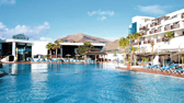 Relax by the pool at Sandos Papagayo
