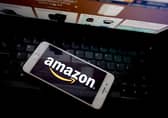 Amazon app seen on a mobile phone. Photo by Edward Smith/Getty Images