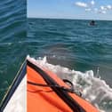 Windsurfer is rescued by RNLI after boom snapped.