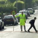 Children are being urged to look up from their phones when they cross the road, in a new safety campaign by children's newspaper First News (Photo by National World)