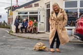 Jackie Leek takes her giant pet tortoise called Mr Miyagi on regular walks to the pub.