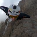 Wingsuit jumper Tim Howell leaps off Mount Kilimanjaro at 5,450m.