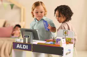 Aldi is launching its new wooden toy Specialbuys event featuring a checkout till, pictured