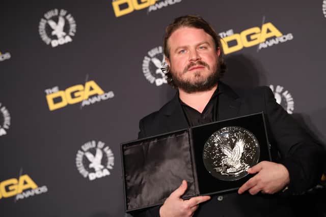 The Brutalist director Brady Corbet with the silver medallion for his Directors Guild of America Theatrical Feature Film nomination