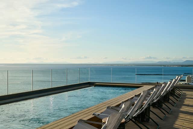 The Star Prestige rooftop terrace with an infinity pool