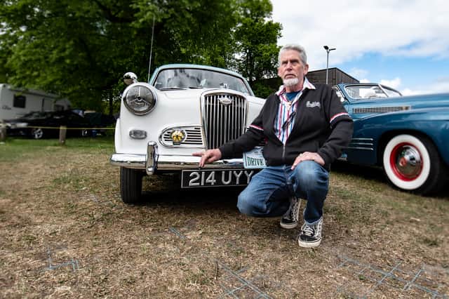 Dennis Jackson stands next to his 1958 Wolesley 1500 classic car at the VE Day Festival in Blackburn. Photo Credit: Lucinda Herbert