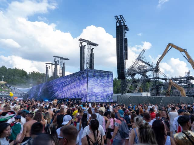 Despite a fire ripping through the main stage days before the festival was about to begin, a spokesperson for Tomorrowland 2025 thinks the DJs this year enjoy being up close and personal with festivalgoers. 