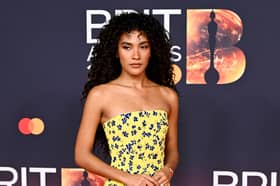 Olivia Dean wore a floral dress at The Brit Awards 2026.