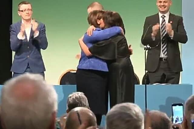 Foyle MP Elisha McCallion and Sinn Fin president Mary Lou McDonald embrace in the Millennium Forum.