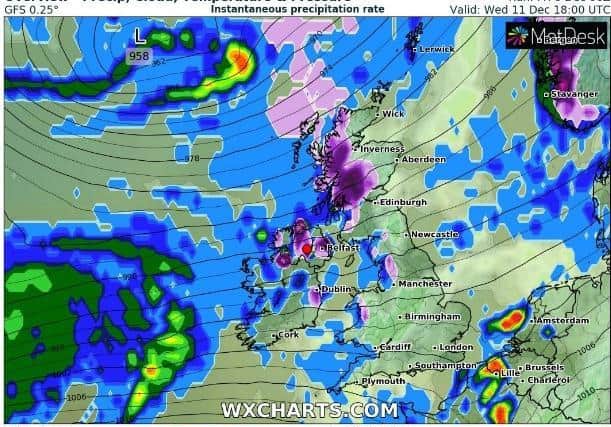 The purple coloured sections of the map over Northern Ireland denote snowfall. (Image: WXCharts.com)