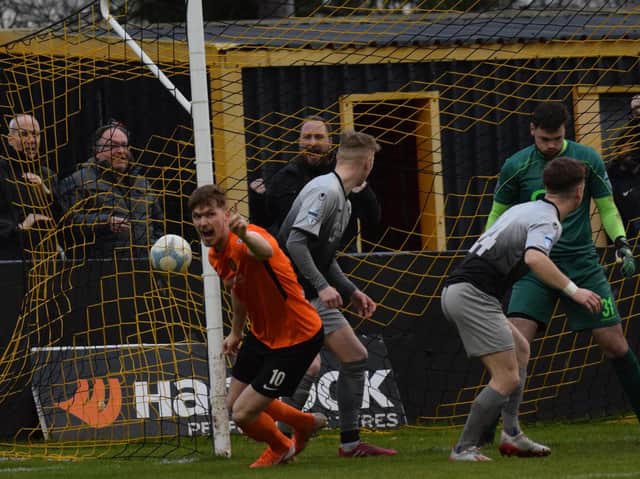 Carrick Rangers' Daniel Kelly celebrates giving his side an early lead against Institute.