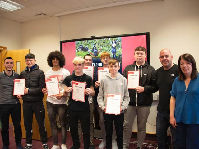 Participants on the Princes Trust Training Team receive their certificate at the end of their 12 weeks course. Also pictured are Conor Hassan, NWRC Careers, Sean Curran, Team Leader with the Princes Trust at NWRC, and Jacqueline Williamson, Chief Executive of Kinship Care NI, who partnered with the college as part the the Community Project.