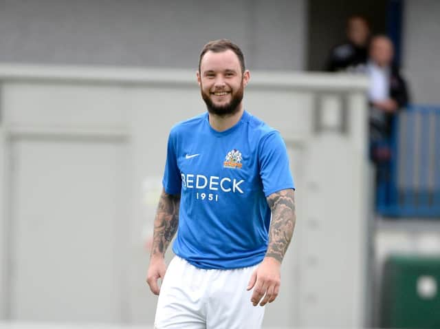 Glenavon's Andrew Doyle headed home just before the break, at a rain swept Brandywell.