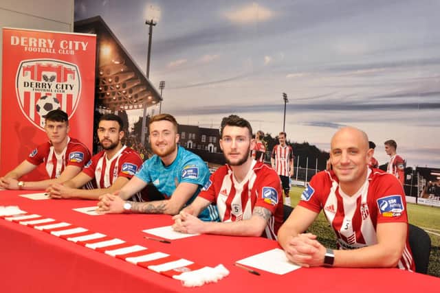 Nathan Gartside (centre) was one of five players to sign new deals with Derry City last week.