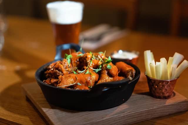 The spicy chicken wings dish is a 'must have' starter at the Railway Tavern