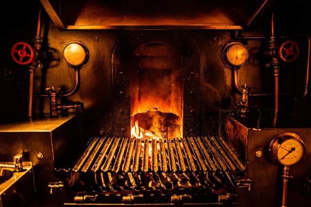 The famous open fire grill at the Railway Tavern.