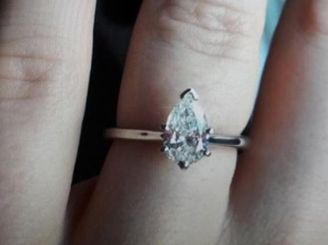 The missing diamond ring.