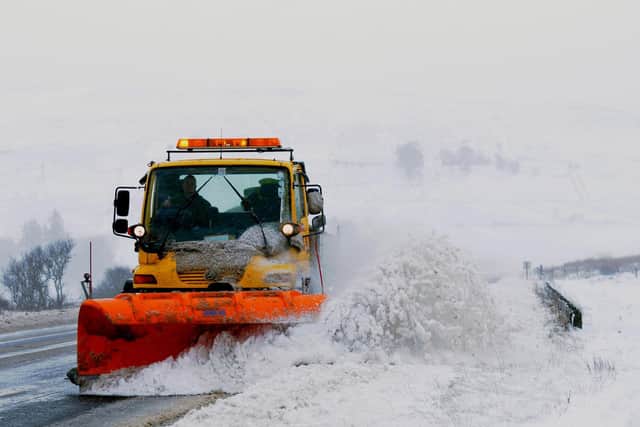 A snow plough is used to clear the road on the Glenshane Pass in 2013.