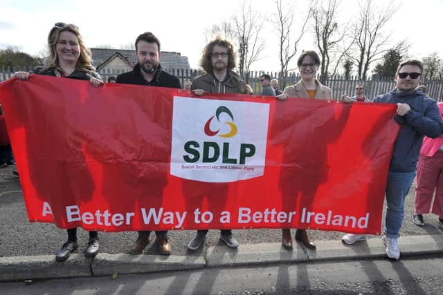 SDLP representatives, including leader Colum Eastwood, at a previous Border Communities Against Brexit protest  held at Bridgend. DER1319GS-074