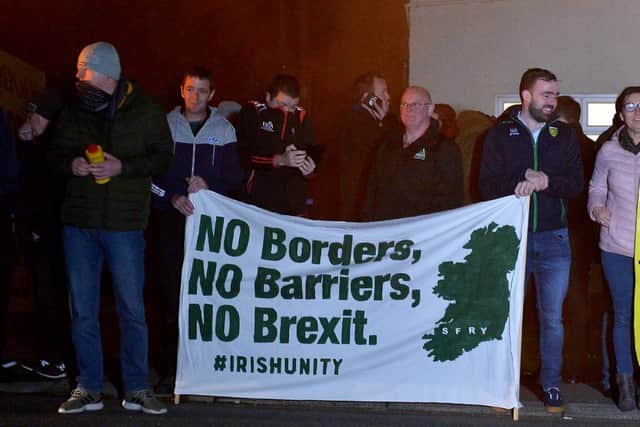 Border Communities Against Brexit supporters attending a previous demonstration at Bridgend.  DER4119GS - 028