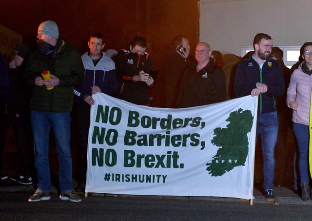 Border Communities Against Brexit supporters attending a previous demonstration at Bridgend. DER4119GS - 028