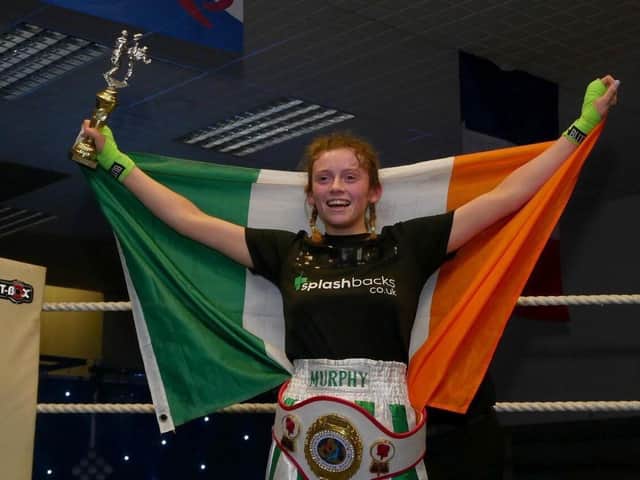 Caitlin pictured celebrating her victory in the Six Nations title fight in Scotland last weekend.