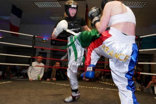 Derry girl, Caitlin lands a kick to her French opponent on her way to victory in the Six Nations title fight.