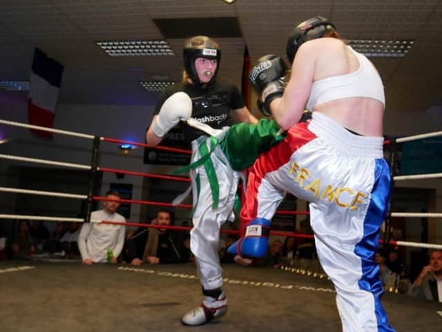 Derry girl, Caitlin lands a kick to her French opponent on her way to victory in the Six Nations title fight.