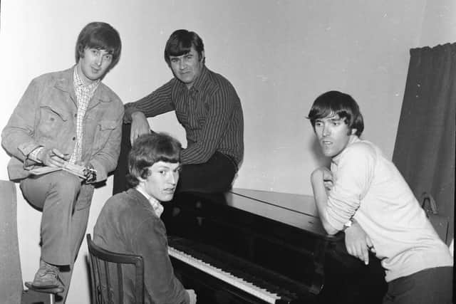 The Spencer Davis Group, fronted by Stevie Winwood (sitting at piano), backstage at The Embassy.
