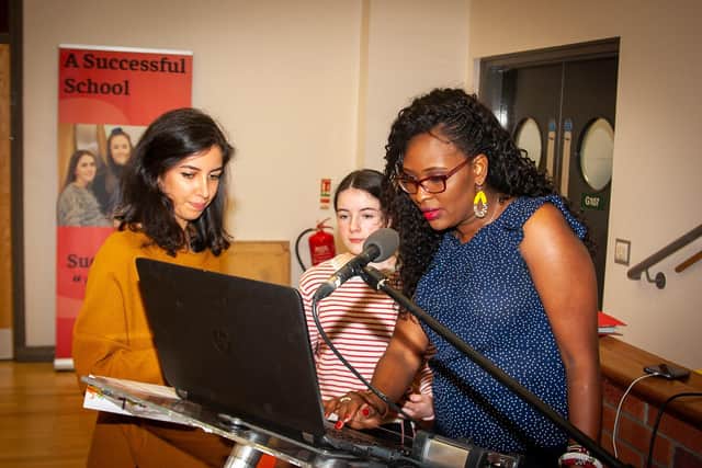 Lilian Seenoi-Barr and some of her volunteers putting the final touches to Friday nightâ€TMs End of Programme event at St. Ceciliaâ€TMs College.