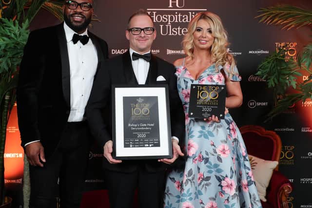 Martin Toye and Amanda Doherty from Bishops Gate Hotel in Derry with Ugo Monye at the Hospitality Ulster Top 100 Awards in the Crowne Plaza Belfast.