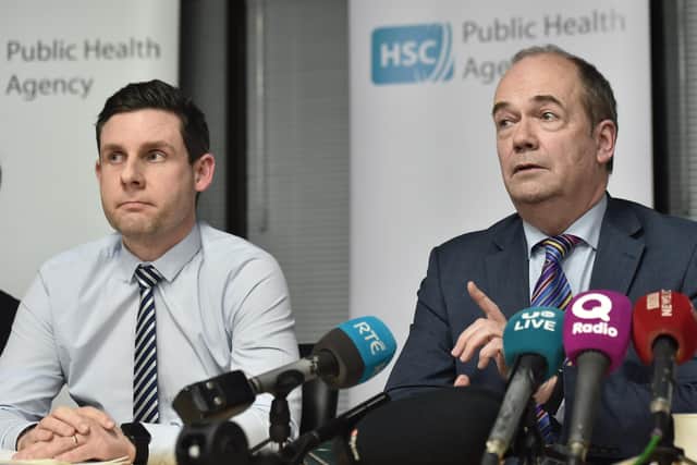 Chief Medical Officer Dr Michael McBride (right), flanked by Dr Philip Veal (consultant in health protection), announces the first positive NI coronavirus case in Belfast on Thursday night