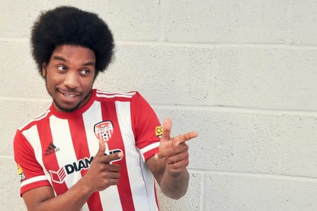 Derry City's Walter Figueira, is liking the new Derry City home jersey.