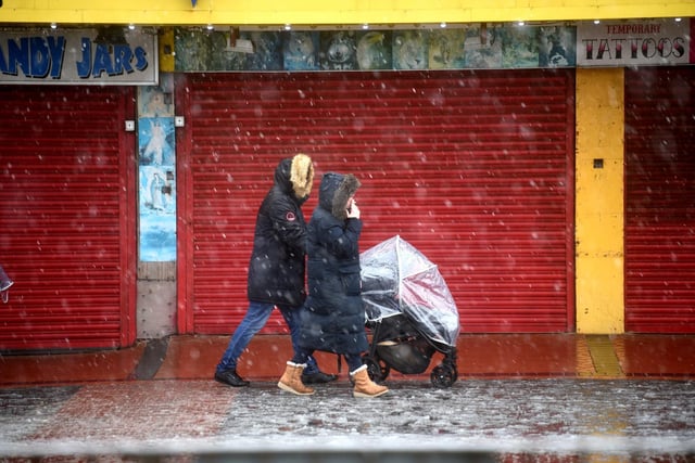 A family braves the snow in Blackpool