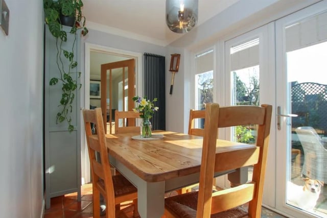 French doors lead from the kitchen into the garden