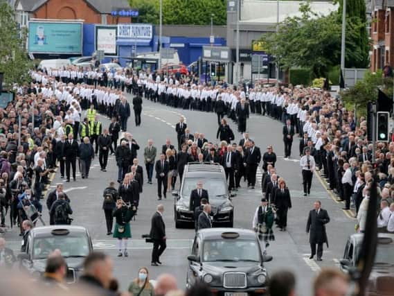 The funeral of Bobby Storey making its way through Belfast on Tuesday.