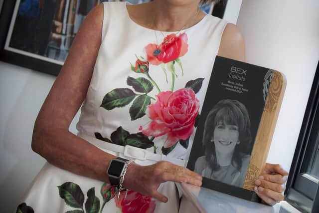 HALL OF FAME. . . .Marie Lindsay, Principal, St. Maryâ€TMs College, Derry, pictured with her prestigioius Bex Institute Excellence Hall of Fame Award at the school on Friday last after a surprise belated presentation by governors and staff. (Photo: Jim McCafferty Photography) SEE BELOW FOR FURTHER INFO.