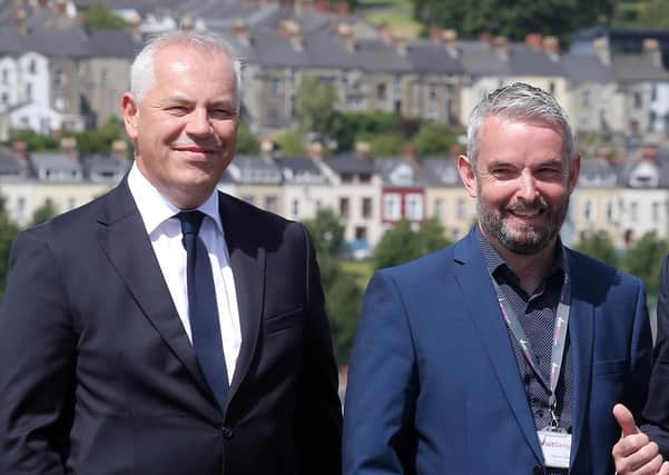 Manager of Visit Derry, Odhran Dunne pictured previously with Chief Executive of Derry City & Strabane District Council John Kelpie on the City Walls in July 2019.