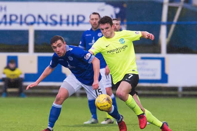 Joe Thomson pictured up against former Hibs and current Scottish international, John McGinn while playing for Queen of the South.