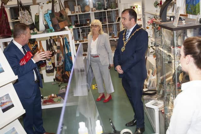 The Mayor, Councillor Brian Tierney pictured during a visit to shops around the District Council area on Friday morning. Included in Number 19, Craft and Design at the Craft Village, Derry are Jim Roddy, manager, City Centre Initiative, Helen Quigley, Chief Executive, Inner City Trust and Gerarda Craig, Number 19.