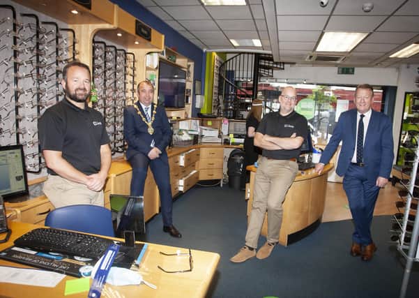 The Mayor, Councillor Brian Tierney pictured during a visit to shops and business premises around the District Council Area on Friday morning. He is pictured at Curtis Opticians, Carlisle Road, Derry with Paul Curtis and Ian Curtis, Proprietors and Jim Roddy, City Centre Initiative.