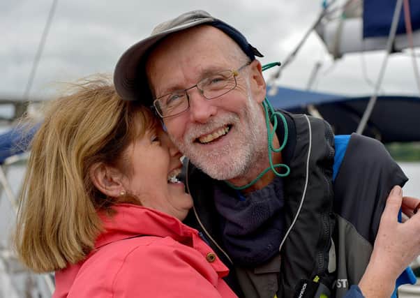 Garry Crothers, aged 64, is welcomed home, by his wife Marie, at the Foyle Marina on Saturday afternoon, after his epic solo voyage across the Atlantic. DER2027GS - 029 (Pictures George Sweeney)