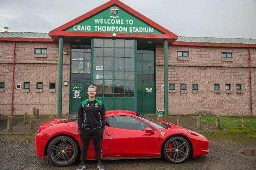 Craig 'Mini Ladd' Thompson outside City of Derry RFC following the announcement of the sponsorship deal in 2017.