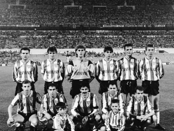 The Derry City team lines up ahead of the European Cup first round, second leg tie against the mighty Benfica at the Estadio da Luz. Included are mascots, Joseph Mahon and Marty McNutt