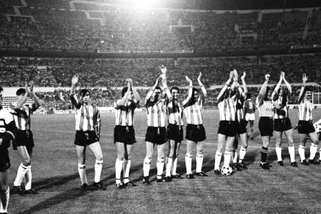 The Derry City players applaud the travelling Candy Stripes support in Lisbon.